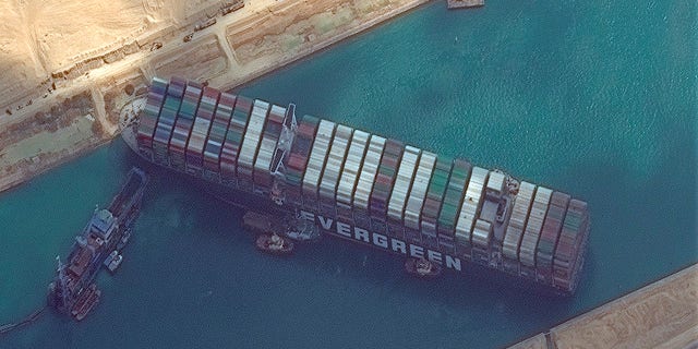 The cargo ship MV Ever Given was freed in the Suez Canal near Suez, Egypt, on Monday. Experts are now investigating what caused the massive vessel to run aground. (©Maxar Technologies via AP)