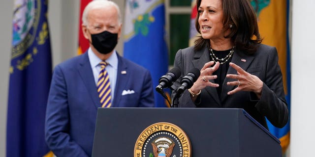 FILE: President Joe Biden listens as Vice President Kamala Harris speaks about the American Rescue Plan, a coronavirus relief package, in the Rose Garden of the White House in Washington. (AP Photo/Alex Brandon, File)