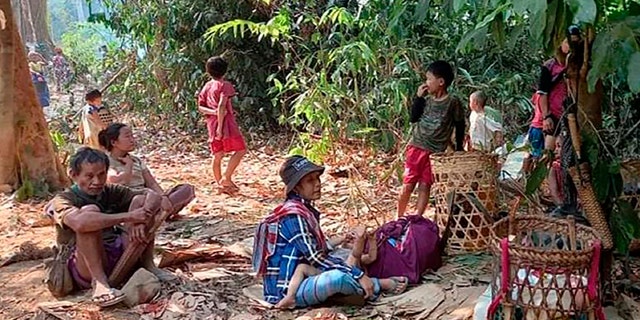 Thousands of people flee airstrikes in Burma, complicating crisis 5 In this photo released by the Free Burma Rangers, Karen villagers gather in the forests as they hide from military airstrikes in the Deh Bu Noh area of Papun district, northern Karen state, in Burma, Sunday March 28, 2021. Thai authorities along its Northwest border prepared for a possible influx of more Karen villagers on Monday, fleeing fear of further airstrikes from the Burmese army. (Free Burmese Rangers via AP)