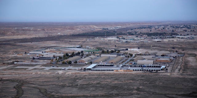 This December 2019, aerial file photo taken from a helicopter shows Ain al-Asad air base in the western Anbar desert, Iraq. (AP)