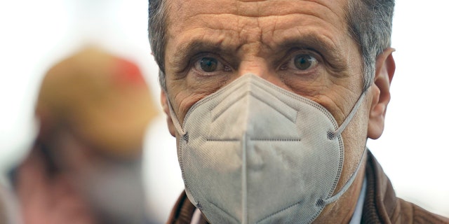 New York Gov. Andrew Cuomo greets people after speaking at a vaccination site on Monday, March 8, 2021, in New York. (AP Photo/Seth Wenig, Pool)