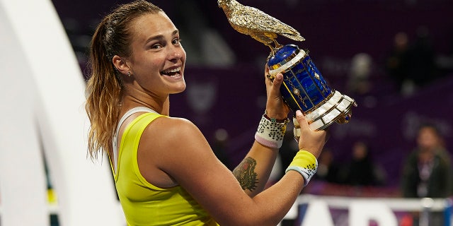 Aryna Sabalenka of Belarus celebrates with the trophy after the Women's Singles Final match at Khalifa International Tennis and Squash Complex on February 29, 2020 in Doha, Qatar.  (Photo by Quality Sport Images / Getty Images)