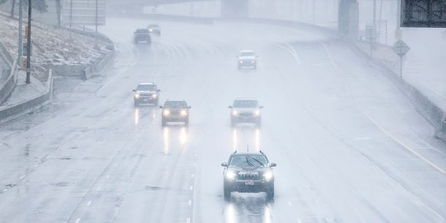 DENVER, CO - MARCH 13: Cars drive along I-25 as it starts to snow on March 13, 2021 in Denver, Colorado. (Photo by Michael Ciaglo/Getty Images)