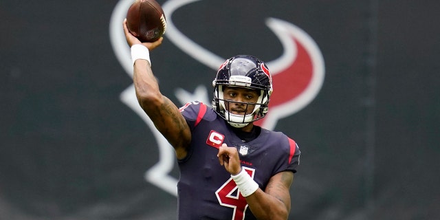 In this Dec. 27, 2020, file photo, Houston Texans quarterback Deshaun Watson throws a pass against the Cincinnati Bengals in Houston.