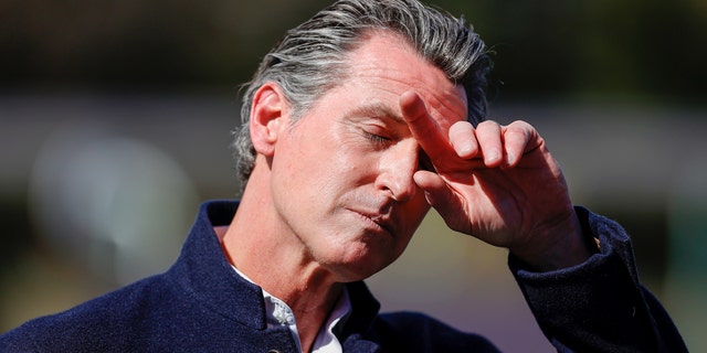 California Gov. Gavin Newsom pauses during a news conference after touring Barron Park Elementary School on March 2, 2021, in Palo Alto, Calif. (Justin Sullivan/Getty Images)