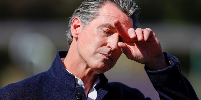 California Gov. Gavin Newsom pauses during a news conference after touring Barron Park Elementary School on March 2, 2021 in Palo Alto, Calif.