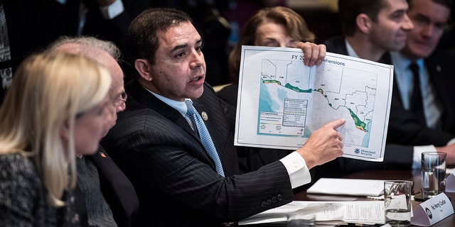 Rep. Henry Cuellar, D-Texas, holds up a border map as he speaks during a meeting with lawmakers on immigration policy in the Cabinet Room at the White House in Washington, D.C., Jan. 9, 2018. (Jabin Botsford/The Washington Post via Getty Images)