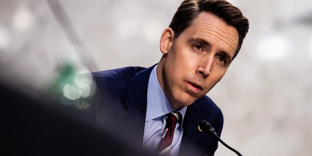 Senator Josh Hawley, a Republican from Missouri, speaks during a Senate Judiciary Committee hearing in Washington, D.C., U.S., on Tuesday, March 2, 2021. Hawley is among the lawmakers who will be skipping President Biden's joint address to Congress on April 28, 2021. Photographer: Graeme Jennings/Washington Examiner/Bloomberg via Getty Images