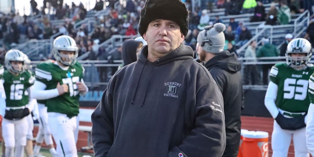 Duxbury High head coach Dave Maimaron on the sidelines against Tewksbury High during the MIAA Division 3 football semifinal at Xaverian Brothers High in Westwood, MA on Nov. 23, 2019. (Photo by Matthew J. Lee/The Boston Globe via Getty Images)