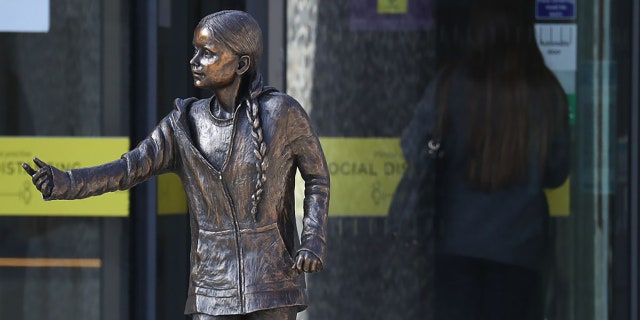 A statue of climate change activist Greta Thunberg has been installed outside the University of Winchester's West Down Centre in Winchester, Hampshire on Tuesday, March 30, 2021. (Photo by Andrew Matthews/PA Images via Getty Images)