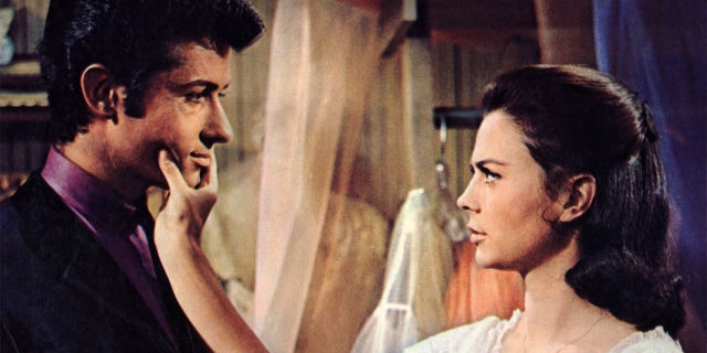 George Chakiris with Natalie Wood filming 'West Side Story'.