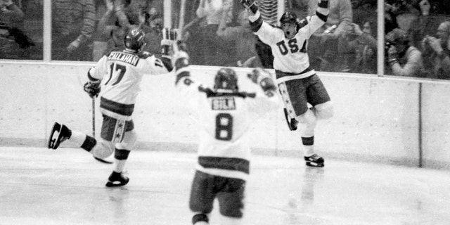 Team USA's Mark Johnson, right, celebrates one of his two goals vs. the Soviet Union during a medal-round game at the 1980 Winter Olympics in Lake Placid, NY., on Friday, Feb. 22, 1980. (Getty Images)