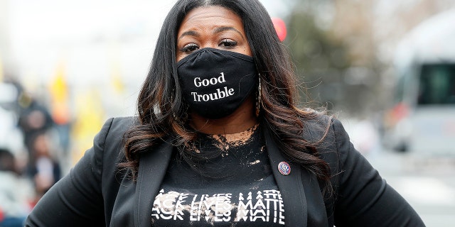 Rep. Cori Bush (D-MO) attends The National Council for Incarcerated Women and Girls "100 Women for 100 Women" rally in Black Lives Matter Plaza near The White House on March 12, 2021. (Photo by Paul Morigi/Getty Images)