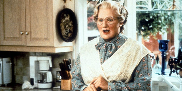Robin Williams in the kitchen in a scene from the film 'Mrs. Doubtfire', 1993. 