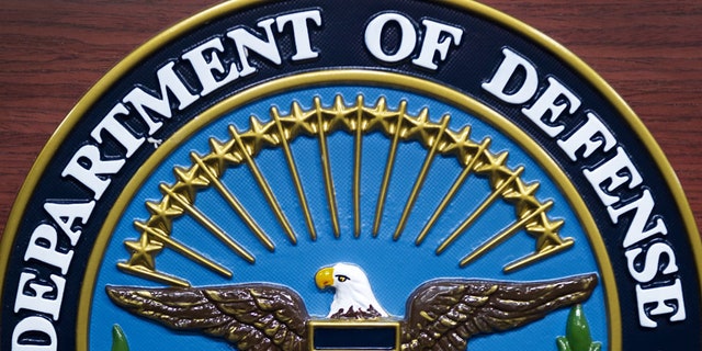 The seal of the US Department of Defense at a lecture in the media briefing room at the Pentagon December 12, 2013 in Washington, DC.
