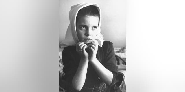 Child star Margaret O'Brien doing an impersonation of actress Jennifer Jones.