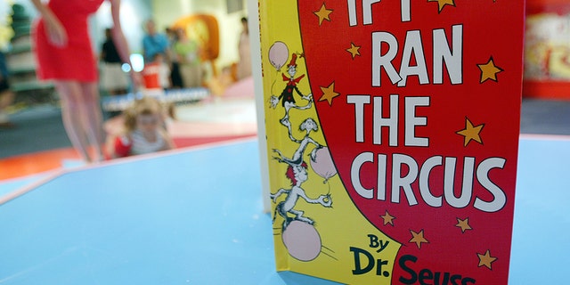 A Dr. Seuss book is seen as children play at the Children's Museum of Manhattan. 
