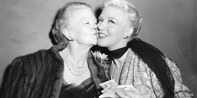 Actress Ginger Rogers is congratulated by her mother, Lela Rogers, after Ginger's first-night performance in the play "Love and Let Love."