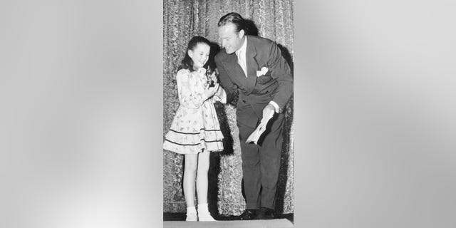 Bob Hope presents Margaret O'Brien with the Academy's first 'Oscarette' in 1944.
