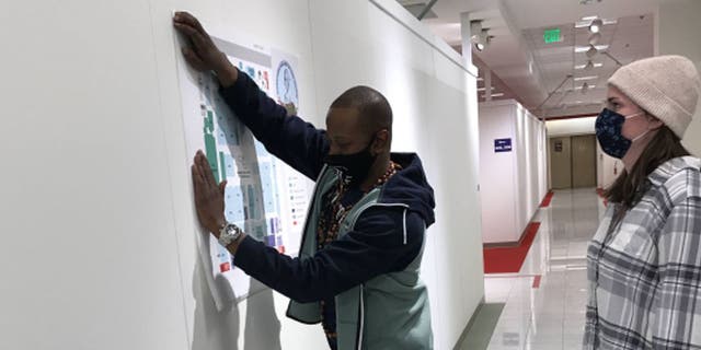 Burlington High School's new home is a retired Macy's store that measures 150,000 square feet. Posted maps help students and staff navigate the space. (Burlington School District)