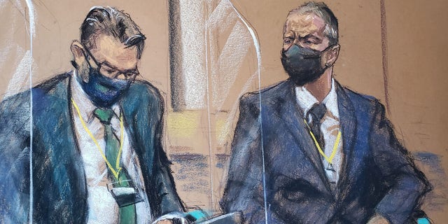 Derek Chauvin, the former Minneapolis police officer facing murder charges in the death of George Floyd, sits beside his defense attorney Eric Nelson on the first day of jury selection in his trial in Minneapolis, Minnesota.