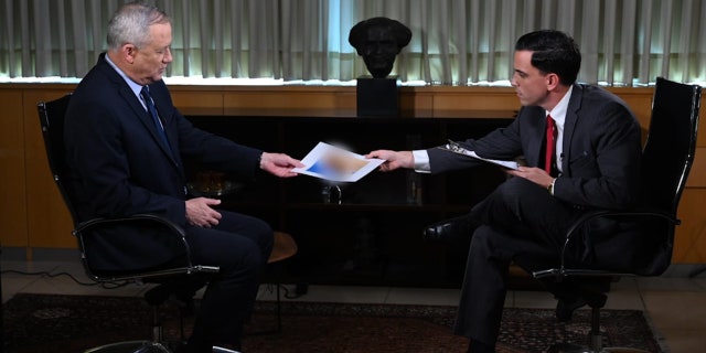 In a Fox News interview, Israeli Defense Minister Benny Gantz shares a classified map of locations of missiles controlled by the Iranian-backed Lebanese militant group Hezbollah.