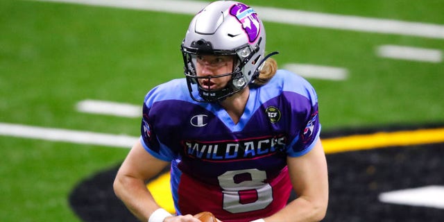 Jackson Erdmann #8 of the Wild Aces rolls out to pass during the second half of a Fan Controlled Football game against the Glacier Boyz at Infinite Energy Arena on March 6, 2021 in Duluth, Georgia. (Photo by Todd Kirkland/Fan Controlled Football/Getty Images)