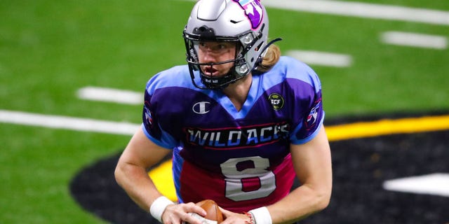 Jackson Erdmann #8 of the Wild Aces rolls out to pass during the second half of a Fan Controlled Football game against the Glacier Boyz at Infinite Energy Arena on March 6, 2021 in Duluth, Georgia. (Photo by Todd Kirkland/Fan Controlled Football/Getty Images)