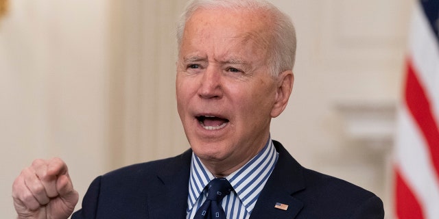 President Joe Biden speaks in the State Dining Room of the White House, Saturday, March 6, 2021, in Washington. (AP Photo/Alex Brandon)