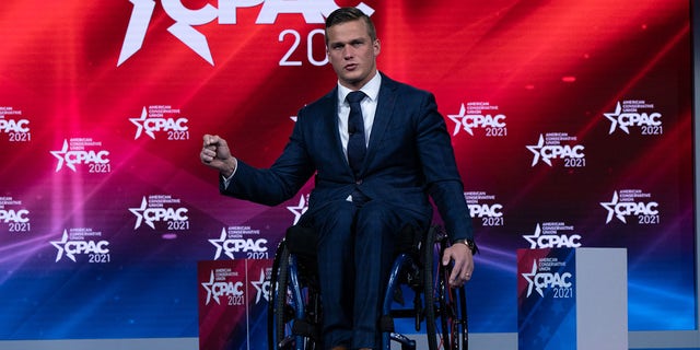 Representative Madison Cawthorn, a Republican from North Carolina, gestures during the Conservative Political Action Conference (CPAC) in Orlando, Florida, U.S., on Friday, Feb. 26, 2021. (Elijah Nouvelage/Bloomberg via Getty Images)