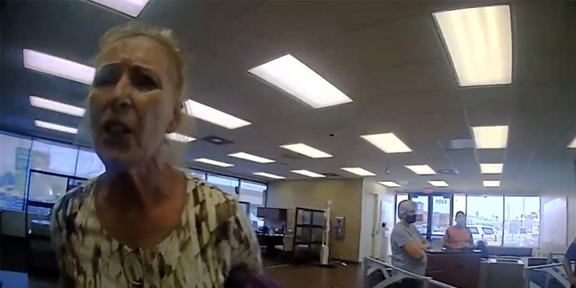 She accused the officer of "taking away people's human rights" in bodycam video of the arrest.