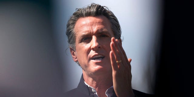 California Gov. Gavin Newson at a news conference March 2. Enough signatures were gathered by opponents of the embattled governor to trigger a recall election.