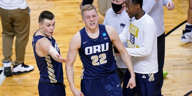 Oral Roberts forward Francis Lacis (22) celebrates after a college basketball game against Florida in the second round of the NCAA tournament at Indiana Farmers Coliseum, Sunday, March 21, 2021 in Indianapolis. Oral Roberts won 81-78. (AP Photo/AJ Mast)