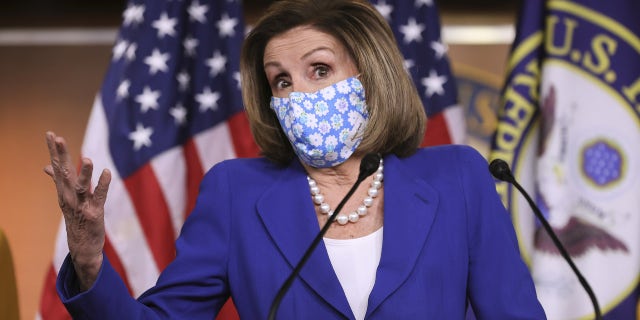 Speaker of the House Nancy Pelosi, D-Calif., speaks during a news conference on Capitol Hill in Washington, Friday, March 19, 2021. (Chip Somodevilla/Pool via AP)