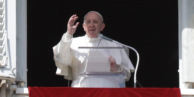 Pope Francis delivers the Angelus noon prayer in St. Peter's Square at the Vatican on Feb. 28. 