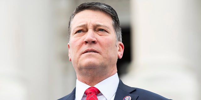 Rep.  Ronny Jackson, R-Texas, is seen during a group photo with freshmen members of the House Republican Conference on the House steps of the Capitol on Monday, Jan.  4, 2021. (Tom Williams / CQ-Roll Call, Inc via Getty Images)