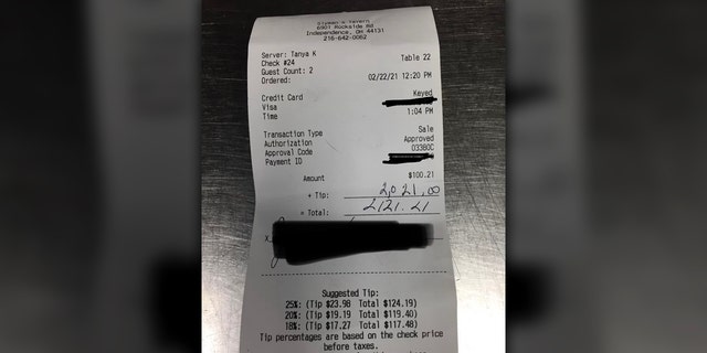 A server at Slymanâ€™s Tavern was shocked when she received a $2,021 tip after bonding with two customers.