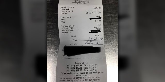 A server at Slymanâ€™s Tavern was shocked when she received a $2,021 tip after bonding with two customers.