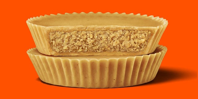 The new candy is similar to an item Reese’s released for limited runs in 2019 and 2020, the Peanut Butter Lovers Cup, which had an extra layer of peanut butter on top of the cup’s candy shell.