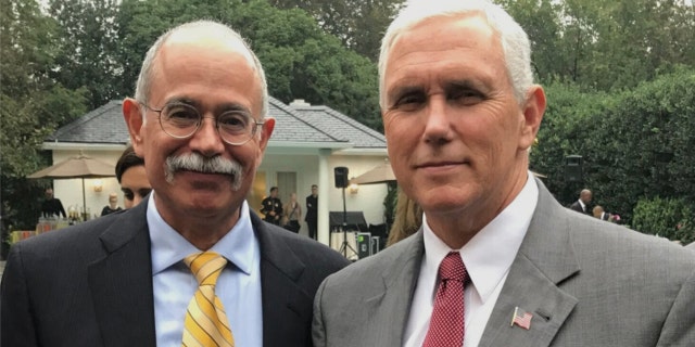 Retired Army Col. Sergio De La Peña (L) and former Vice President Mike Pence (R). (Courtesy Sergio de la Peña for Virginia Governor)