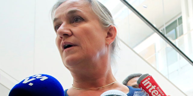 In this Monday, Sept. 23, 2019 file photo, Doctor Irene Frachon, who discovered that the drug Mediator could have fatal side effect, speaks to reporters as she arrived at a Paris courthouse. (AP Photo/Michel Euler)