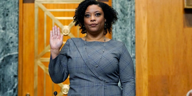 Shalanda Young is sworn in prior to testifying before a Senate Budget Committee hearing to examine her nomination to be Deputy Director of the Office of Management and Budget on Capitol Hill in Washington, Tuesday, March 2, 2021. (AP Photo/Patrick Semansky)