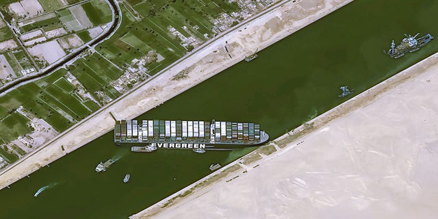 A satellite image shows stranded container ship Ever Given after it ran aground in Suez Canal, Egypt March 25, 2021. CNES/AIRBUS DS via REUTERS ATTENTION EDITORS  THIS IMAGE HAS BEEN SUPPLIED BY A THIRD PARTY. NO RESALES. NO ARCHIVES. MANDATORY CREDIT.