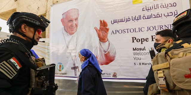 Iraqi security forces deploy in Mosul, northern Iraq, once the de-facto capital of IS, where Pope Francis will pray for the victims of war at Hosh al-Bieaa Church Square, Sunday, March 7, 2021. (Associated Press)