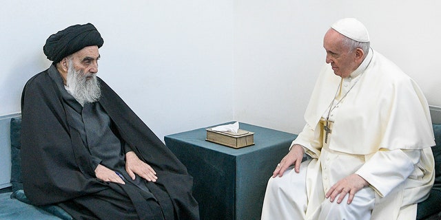 Pope Francis, right, meets with Iraq's leading Shiite cleric, Grand Ayatollah Ali al-Sistani in Najaf, Iraq, Saturday, March 6, 2021. (Associated Press)