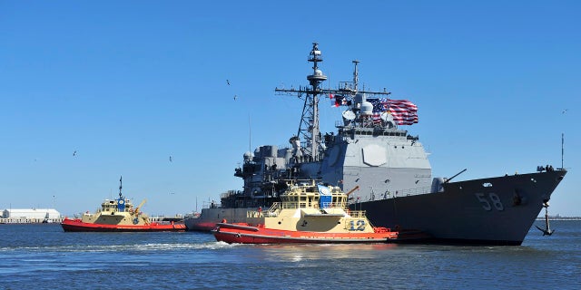 The guided-missile cruiser USS Philippine Sea leaves Naval Station Mayport in Mayport, Fla., in February 2014. (AP/Mass Communication Specialist 2nd Class Marcus L. Stanley/U.S. Navy)