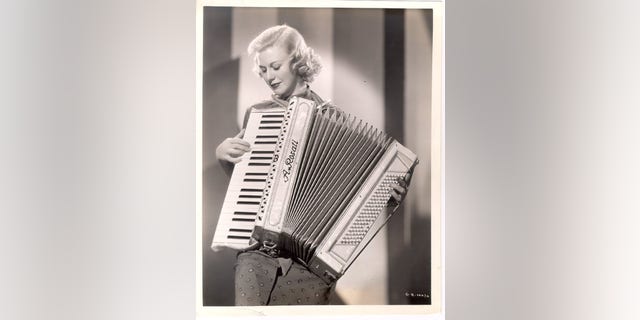 Ginger Rogers and her accordion.
