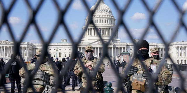 National Guard keep watch on the Capitol, Thursday, March 4, 2021, on Capitol Hill in Washington.  (AP Photo/Jacquelyn Martin)