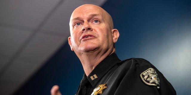 Captain Jay Baker, of the Cherokee County Sheriff's Office, speaks about the arrest of Robert Aaron Long during a press conference at the Atlanta Police Department headquarters in Atlanta, Wednesday, March 17, 2021. (Alyssa Pointer/Atlanta Journal-Constitution via AP)
