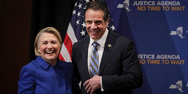 NEW YORK, NY - JANUARY 7: (L-R) Former Secretary of State Hillary Clinton and New York Governor Andrew Cuomo smile at the end of an event to discuss reproductive rights at Barnard College, January 7, 2019 in New York City. The two Democrats shared the stage to promote the Reproductive Health Act in New York, which Cuomo wants the State Legislature to pass in their first 30 days. Under New York's current law, abortions after 24 weeks are illegal unless its necessary to save the woman's life. (Photo by Drew Angerer/Getty Images)